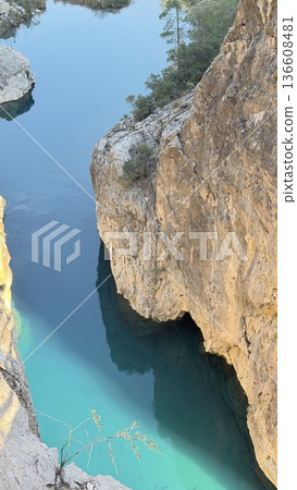 Sunlight of the emerald mountain river. High quality photo 136608481