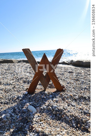Rusty metal structure seashore, nature, seaside. High quality photo Rusty metal structure seashore, nature, seaside. High quality photo 136608634