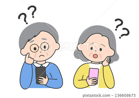可愛的老年男女在使用智慧型手機時遇到困難 可愛的老年男女在使用智慧型手機時遇到困難 136608673
