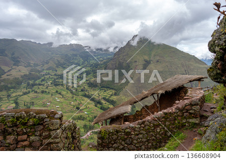 Ancient Inca ruins of Pisac nestled in the Andean mountains, Peru 136608904