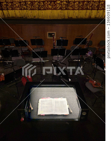 Orchestra pit In theater. Vertical. Conductor place in the orchestra pit. notes copy space 136609118