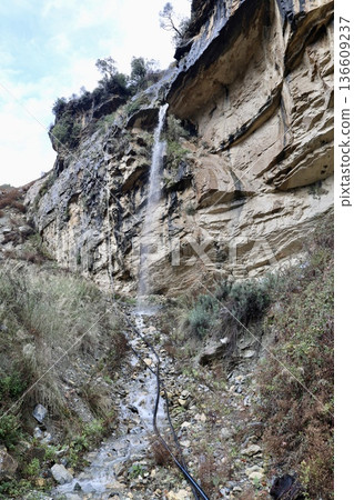 Waterfall rocky cliff. High quality photo Waterfall rocky cliff. High quality photo 136609237