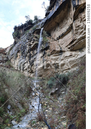 Waterfall rocky cliff. High quality photo Waterfall rocky cliff. High quality photo 136609258
