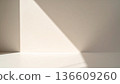A minimalist space background with soft natural light and shadows 136609260
