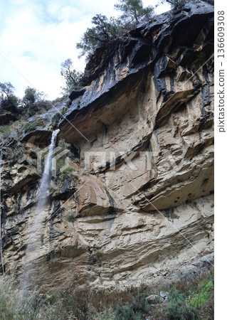 Waterfall rocky cliff. High quality photo Waterfall rocky cliff. High quality photo 136609308