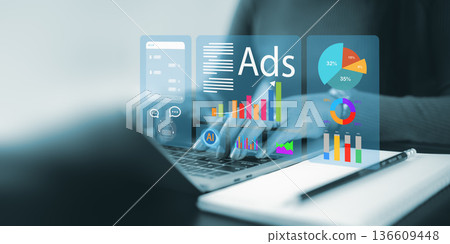Business woman using laptop for AI digital marketing ads and data analytics. Concept of advertising optimization, dashboard statistics, financial growth, and artificial intelligence technology. Business woman using laptop for AI digital marketing ads and data analytics. Concept of advertising optimization, dashboard statistics, financial growth, and artificial intelligence technology. 136609448
