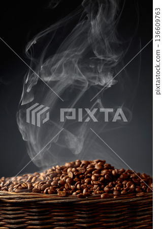 Fresh roasted coffee beans in old basket. 136609763