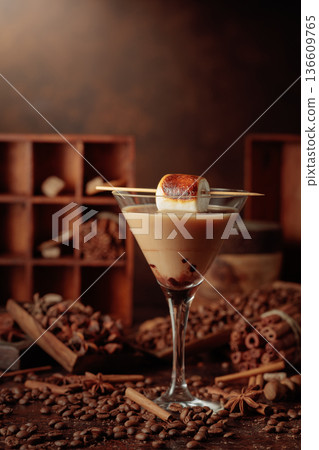 Cream and coffee cocktail, decorated with toasted marshmallow. 136609765
