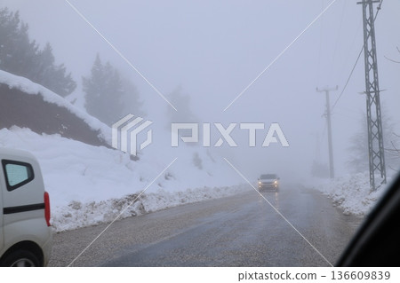 Foggy snowy road. High quality photo 136609839