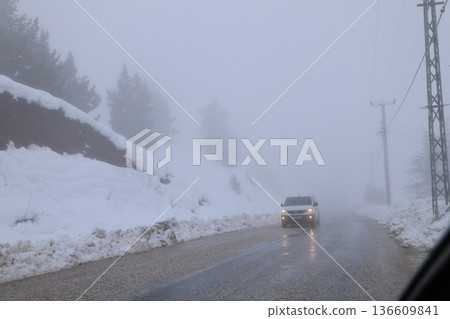 Foggy snowy road. High quality photo Foggy snowy road. High quality photo 136609841