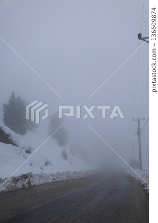 Foggy snowy road. High quality photo Foggy snowy road. High quality photo 136609874