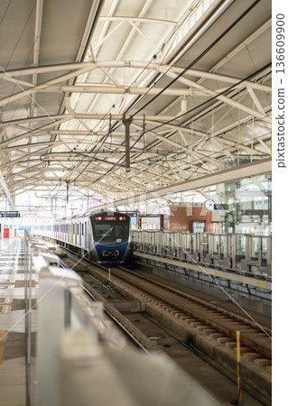 A train stopping at a Jakarta MRT station 136609900