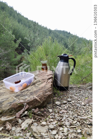 Flask tea outdoors. High quality photo Flask tea outdoors. High quality photo 136610303