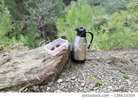 Flask tea outdoors. High quality photo Flask tea outdoors. High quality photo 136610309