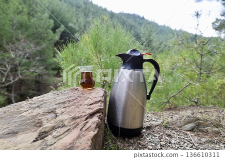 Flask tea outdoors. High quality photo 136610311
