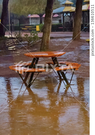 Flooded picnic table. High quality photo Flooded picnic table. High quality photo 136610511