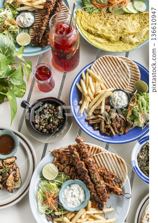 many different mediterranean food dishes on restaurant table in greece many different mediterranean food dishes on restaurant table in greece 136610947
