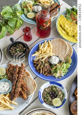 many different mediterranean food dishes on restaurant table in greece many different mediterranean food dishes on restaurant table in greece 136610952
