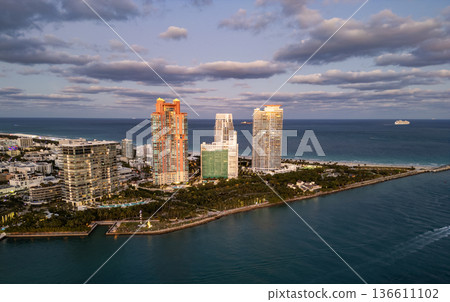 Skyline panorama. Sea beach. Miami South beach landscape aerial view. Skyline aerial on Miami marina, Florida. Aerial Miami south beach with sunset. Marina landscape in South Beach. Miami skyline 136611102
