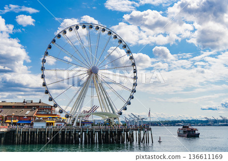 Seattle, Washington, USA, July 26, 2024: Ferris wheel. Amusement park with Ferris wheel. Observation Ferris wheel. Fairground ride on observation wheel. Entertainment park. Copy space 136611169