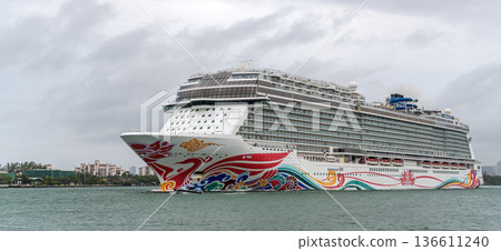 Miami, Florida, USA - November 07, 2024: Ship of NCLH. Norwegian Joy cruise ship voyage. Cruise in summer vacation. Norwegian Cruise line. Cruise ship tour and travel at sea 136611240