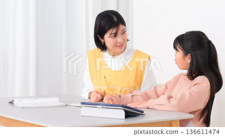 Elementary school students playing after-school activities 136611474