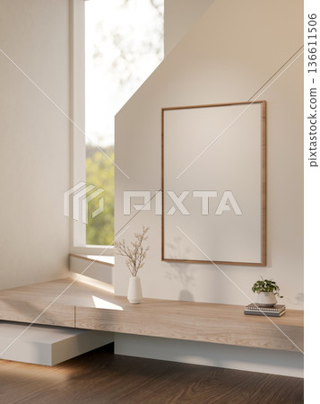 White frame over a vase and plant on books aside wooden staircase and sunshine through wall window. White frame over a vase and plant on books aside wooden staircase and sunshine through wall window. 136611506