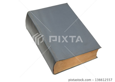 Old blue book placed at angle with visible yellowed pages isolated on white background. Old blue book placed at angle with visible yellowed pages isolated on white background. 136612557