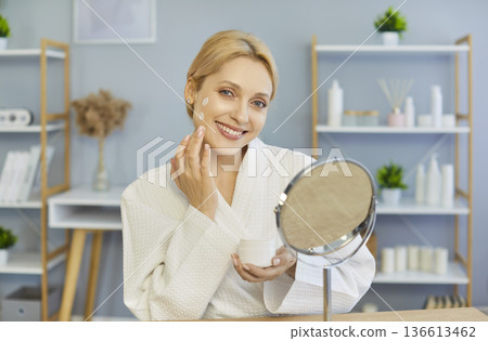 Portrait Of Happy Woman With Cream Portrait Of Happy Woman With Cream 136613462