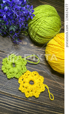 Knitted flowers and circles suitable for home decor, fashion, or textiles. Knitted flowers and circles suitable for home decor, fashion, or textiles. 136614277