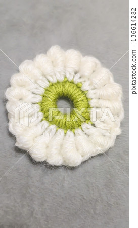 Knitted flowers and circles suitable for home decor, fashion, or textiles. Knitted flowers and circles suitable for home decor, fashion, or textiles. 136614282