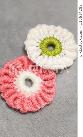 Knitted flowers and circles suitable for home decor, fashion, or textiles. Knitted flowers and circles suitable for home decor, fashion, or textiles. 136614288