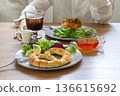 A woman eating a stylish breakfast 136615692