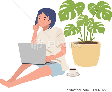 Work From Home Freelancer Using Laptop Sitting on Floor with Indoor Plant Work From Home Freelancer Using Laptop Sitting on Floor with Indoor Plant 136616809