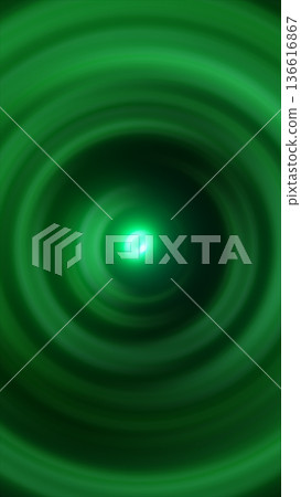 Abstract green energy vortex with glowing concentric waves and luminous core on dark background, futuristic motion and sci-fi atmosphere 136616867