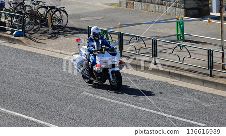 Image of a police motorcycle on patrol Image of a police motorcycle on patrol 136616989