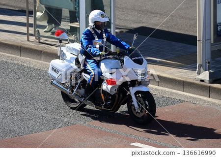 Image of a police motorcycle on patrol Image of a police motorcycle on patrol 136616990