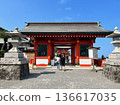 The vermilion tower gate and blue sky of Udo Shrine in Miyazaki Prefecture 136617035