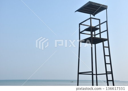 lifeguard chair platform used to monitor swimming area for safety at Khai Chet Beach travel location in Thailand lifeguard chair platform used to monitor swimming area for safety at Khai Chet Beach travel location in Thailand 136617331
