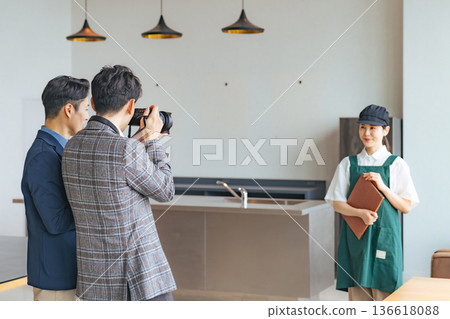 Restaurant staff taking profile photos 136618088