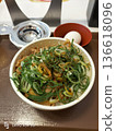 Beef bowl with green onions and egg topping 136618096