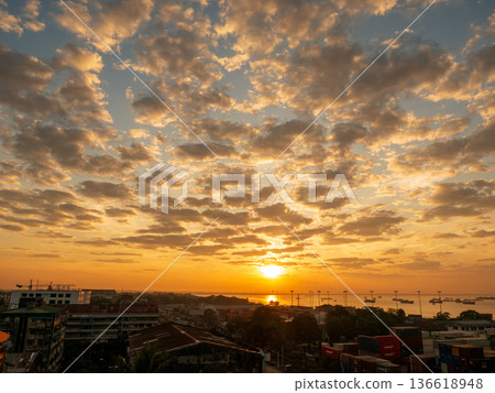 Scenic view dramatic beautiful sunset sky. Natural Sunset Sunrise on meadow silhouette shadow dark land. Vibrant dramatic sky on sunset, dawn, sunrise in Countryside. Landscape Colorful Sky At Sunset Scenic view dramatic beautiful sunset sky. Natural Sunset Sunrise on meadow silhouette shadow dark land. Vibrant dramatic sky on sunset, dawn, sunrise in Countryside. Landscape Colorful Sky At Sunset 136618948