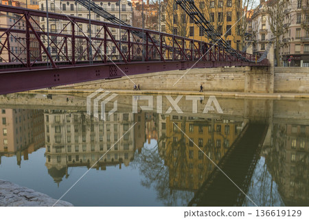 Bridge over the river in Lyon with building reflections on the water Bridge over the river in Lyon with building reflections on the water 136619129
