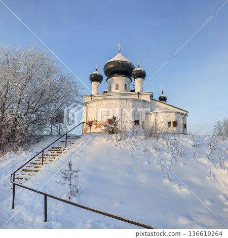 A large white church with a steeple, wintertime. A large white church with a steeple, wintertime. 136619264