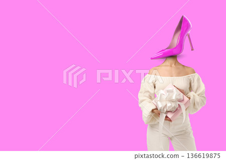 Woman with heel instead head holding gift box Woman with heel instead head holding gift box 136619875