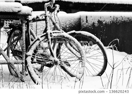 old vintage bicycle parked in a city street 136620243