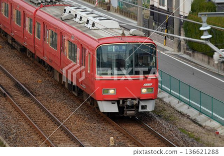 A fast-moving Meitetsu 3500 series train (2nd generation) A fast-moving Meitetsu 3500 series train (2nd generation) 136621288