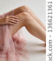 An enchanting lady radiating elegance through her delicate dress and poised demeanor 136621361