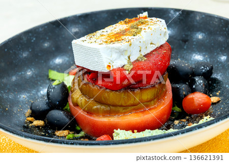 Feta, Tomato, pepper and Eggplant starter dish Feta, Tomato, pepper and Eggplant starter dish 136621391