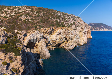 A rugged coasts of Patara beach, Turkey. Natural cliffs A rugged coasts of Patara beach, Turkey. Natural cliffs 136622060